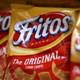Bags of Fritos on grocery shelf